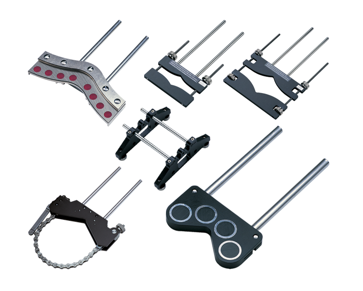 Fästen för axeluppriktning.