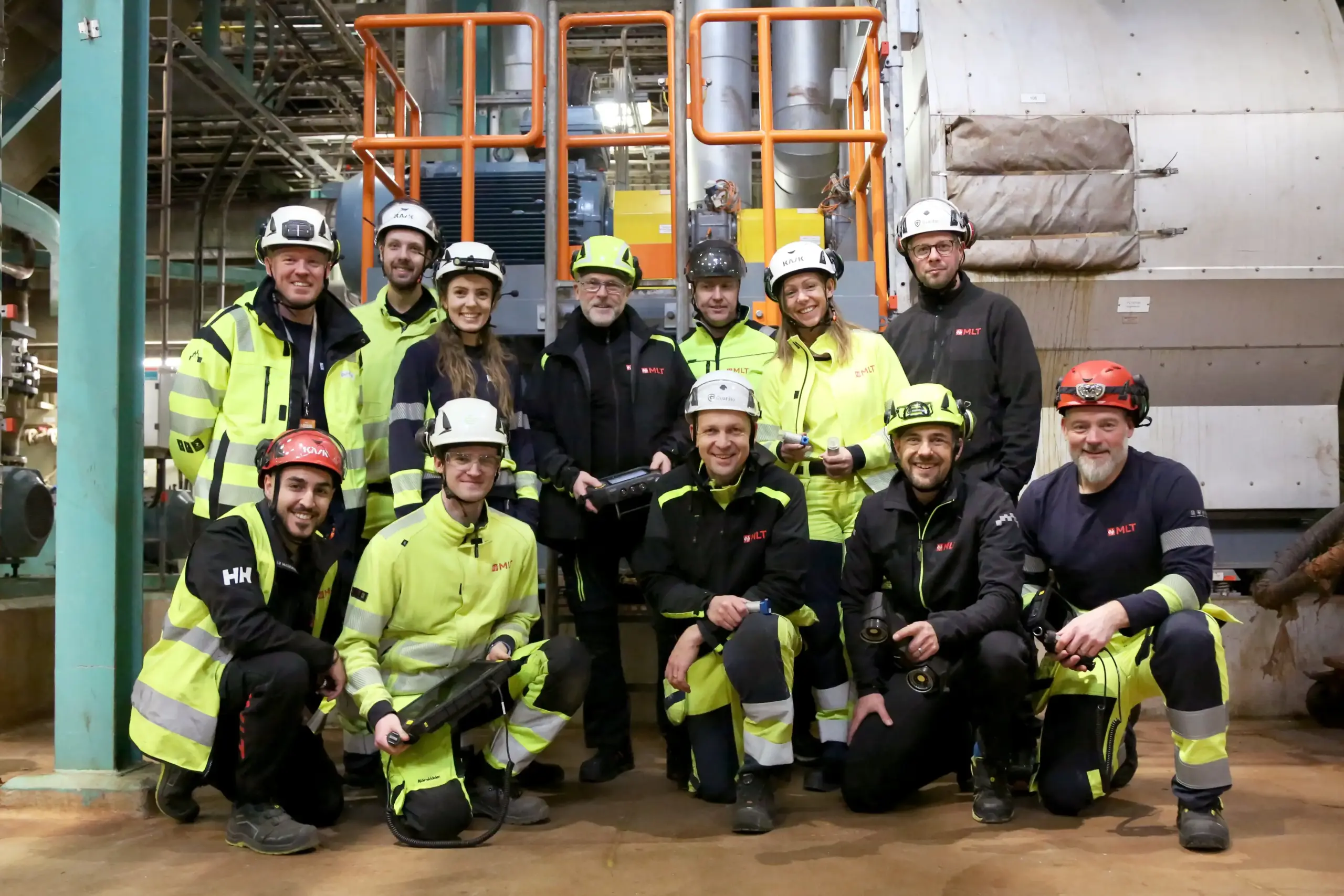 Gruppfoto med ett gäng medarbetare från MLT